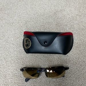 Ray-Ban sunglasses (made in Italy).